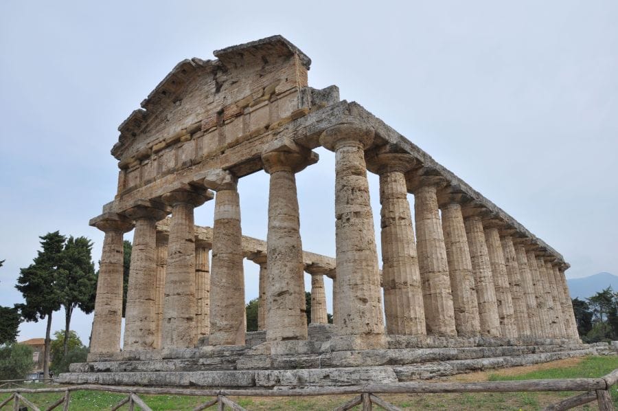 Temple of Hera I, the oldest of the ancient Greek temples at Paestum Ancient temple ruins in italy, showing a structure with multiple columns, front upper facade and steps