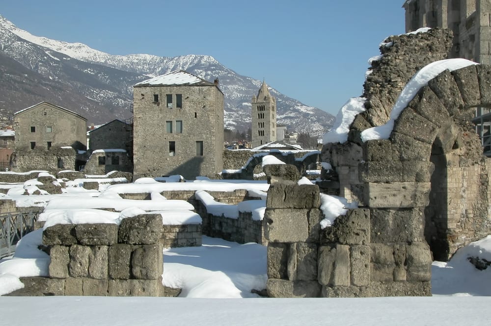 Roman ruins in snow in Aosta, Italy Winter in the Valle d'Aosta