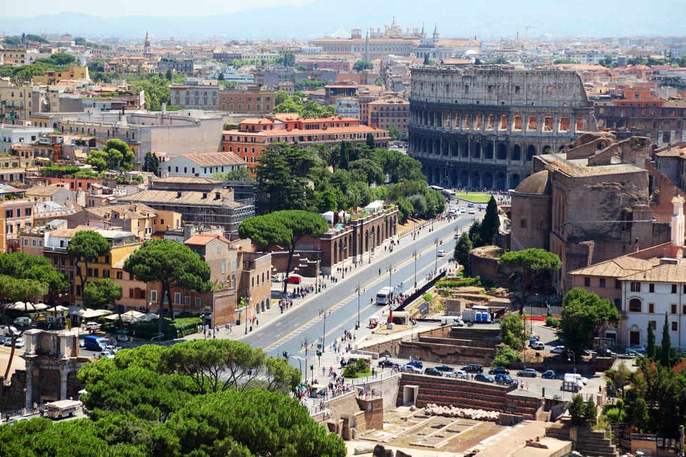 Accommodation in Italy can be found near the main tourist spots, like this main street that leads to the colosseum, with the buildings surrounding it