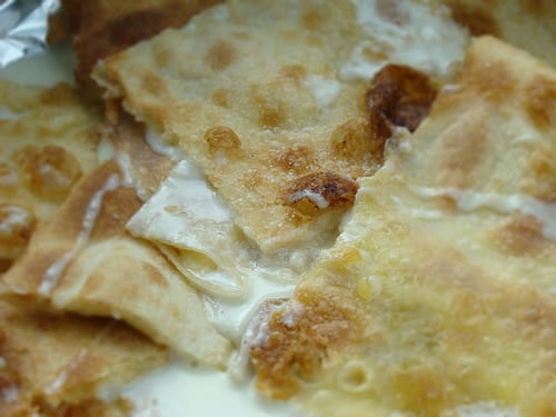 Focaccia con il formaggio di Recco! Paper thin Italian focaccia bread with a creamy cheesy sauce