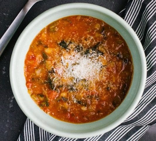 Best foods in Italy in winter One of the most famous italian winter dishes, a bowl of hearty vegetable soup called Ribollita. it is a Tuscan soup made with cannellini beans, vegetables, and leftover bread