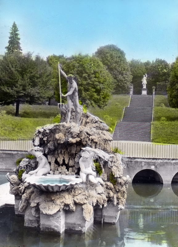a fountain featuring a bronze statue of neptune, with his trident, in the Boboli Gardens in Florence