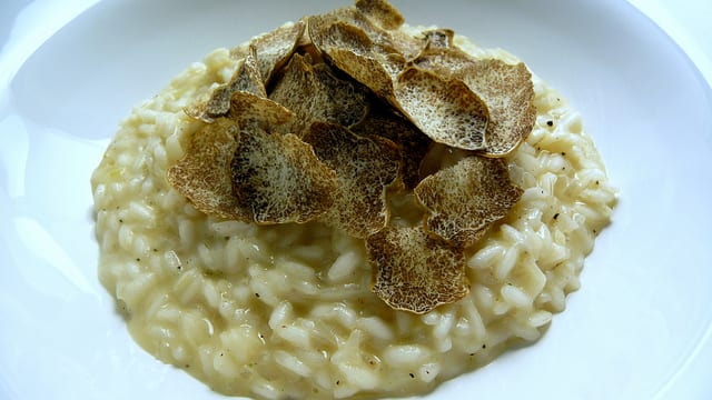 White truffle risotto is just one of the many delicious truffle dishes that the annual truffle festivals offer. Photo by Blue moon in her eyes (Flickr)