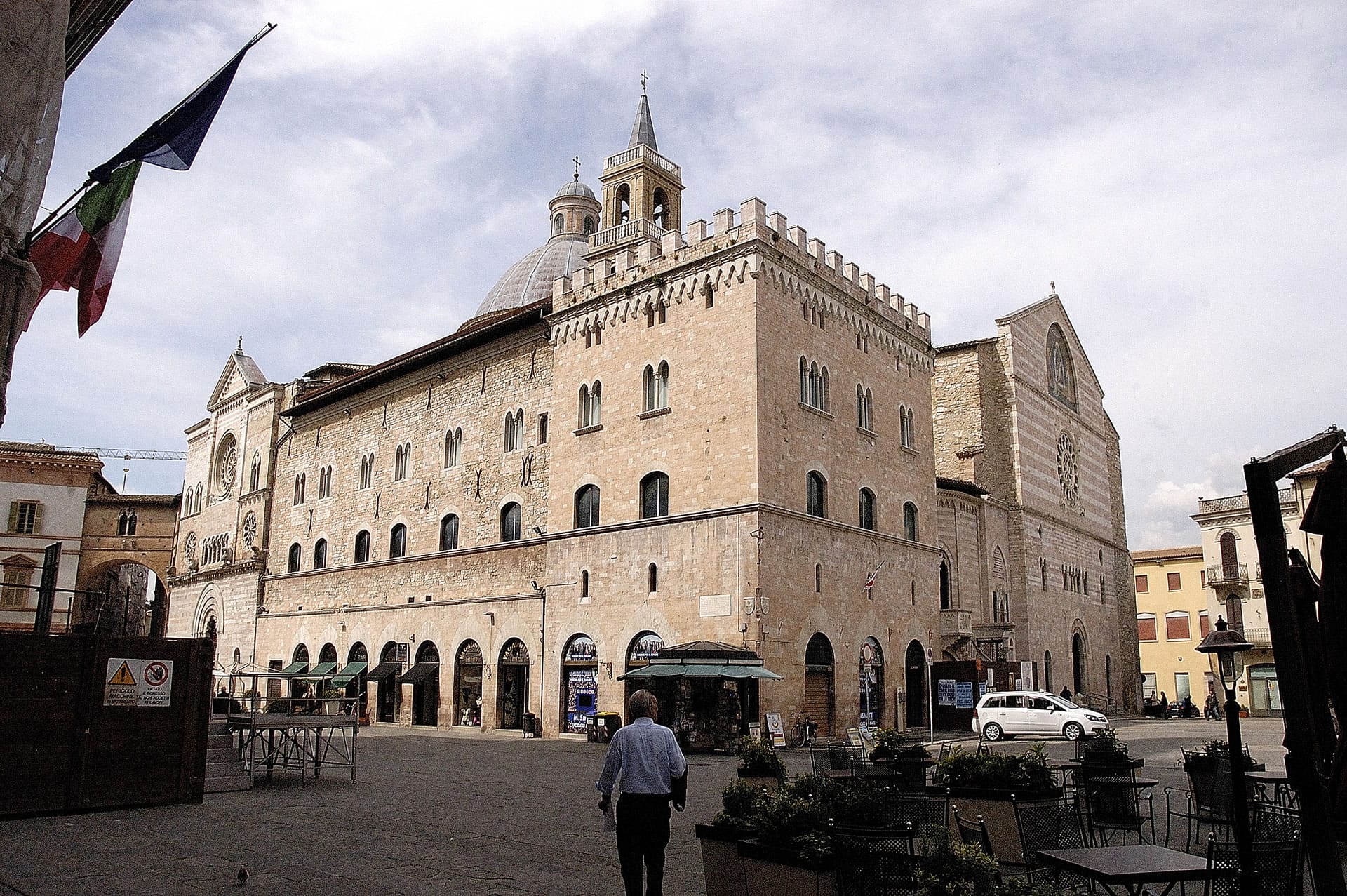 The historical centre of Foligno in Umbria in central italy, a grand castle like building in the markets square with turrets, dome and central spire