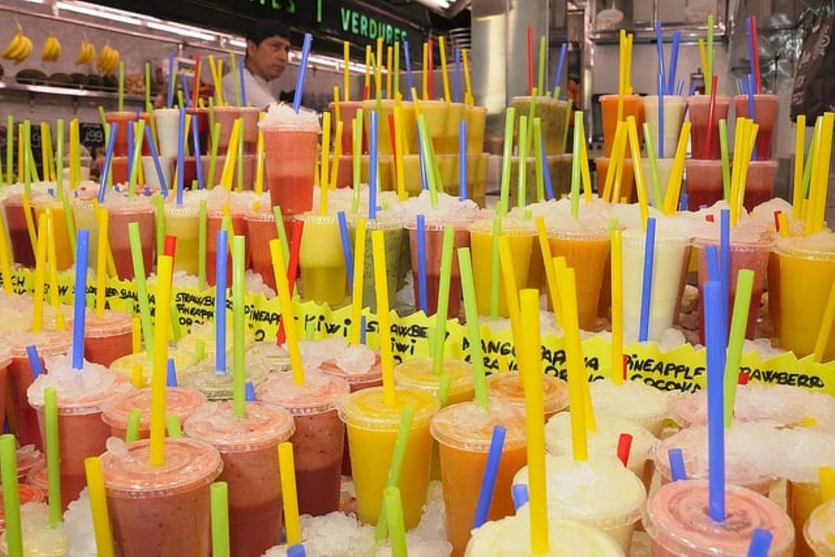 A large display of various colors of granita in Italy.