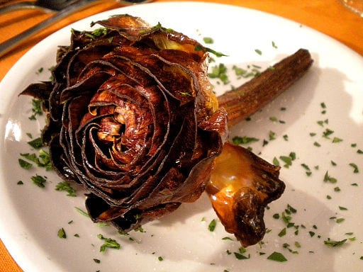 carciofi alla guidea, or deep fried artichoke, is one of the Rome's most beloved Jewish foods. Find out the rest in our blog!