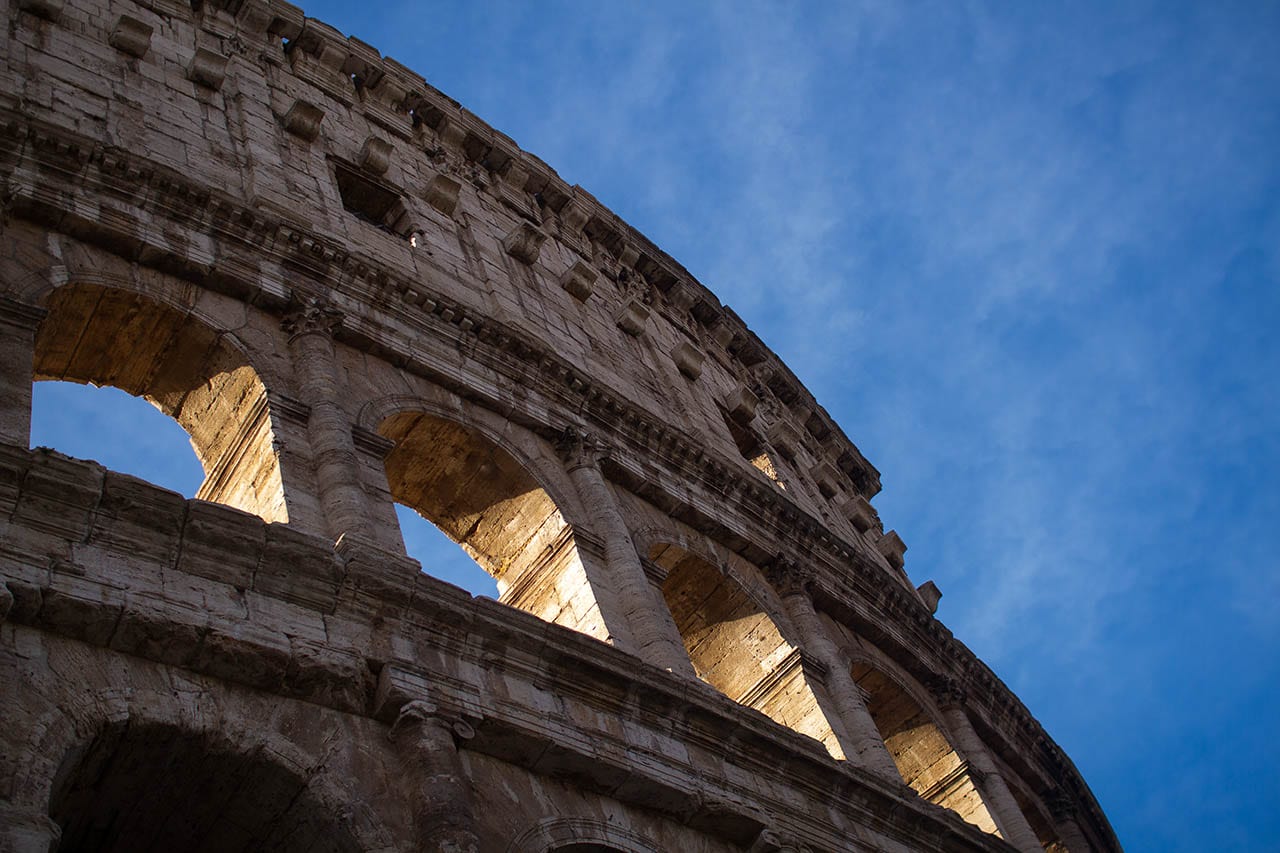 a close up of a section of the exterior wall showing what is the colosseum made of 