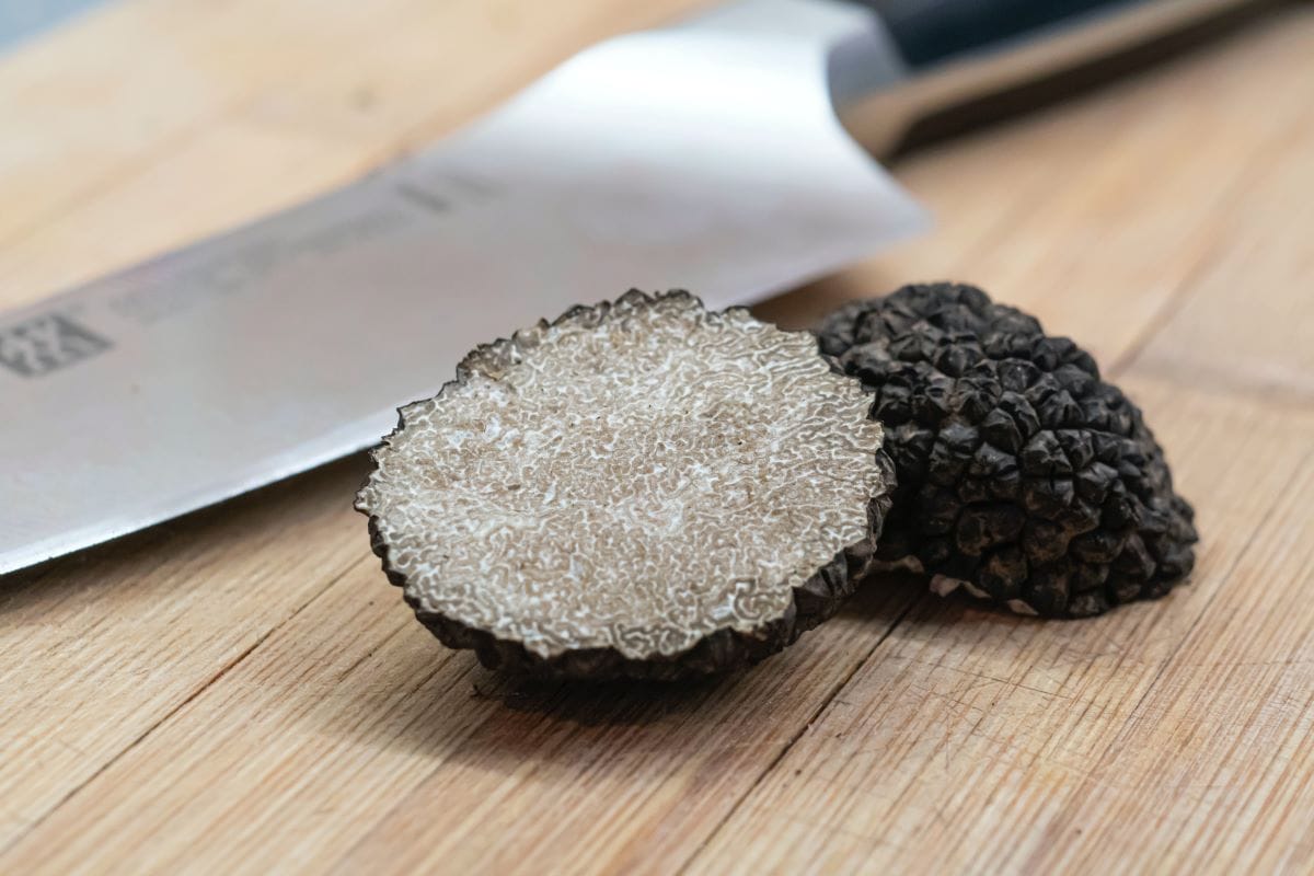 close up of Italian truffle cut in half. 