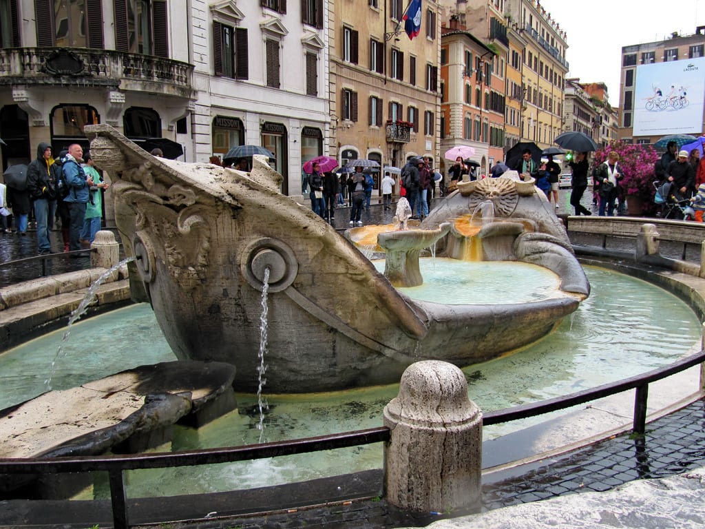 The Fontana della Barcaccia in Rome | Photo by Steve Johnson https://www.flickr.com/photos/stephoto/4599826806/in/photolist-81tjfJ-6nTtSo-9s2QAQ-pM7fCa-dFnxJ6-5vSNyH-6zwgSu-g8A8Q3-cQV5SA-W5nyN-95fEr9-hscvfT-9uRmQb-cQV6KC-cai2bA-4EeMh3-cQV71b-5TwXWh-a6d82z-5TwDQJ-axACJK-7ektx4-95fCQy-cQV69U-svCaNq-a3x7Xr-cQV6kN-cQV6zb-aAanKP-4Uamio-5gmCuH-caiEEN-5is4eJ-wTNQbR-6W2spY-2W5oaj-31f1g4-aAaqT8-78vNN3-aAapAc-4xM5G-cai2t3-Mj8np-aAd5Mj-axAGLX-cai2HW-dwkocZ-6UGrbg-dwko8M-aAd8Qy