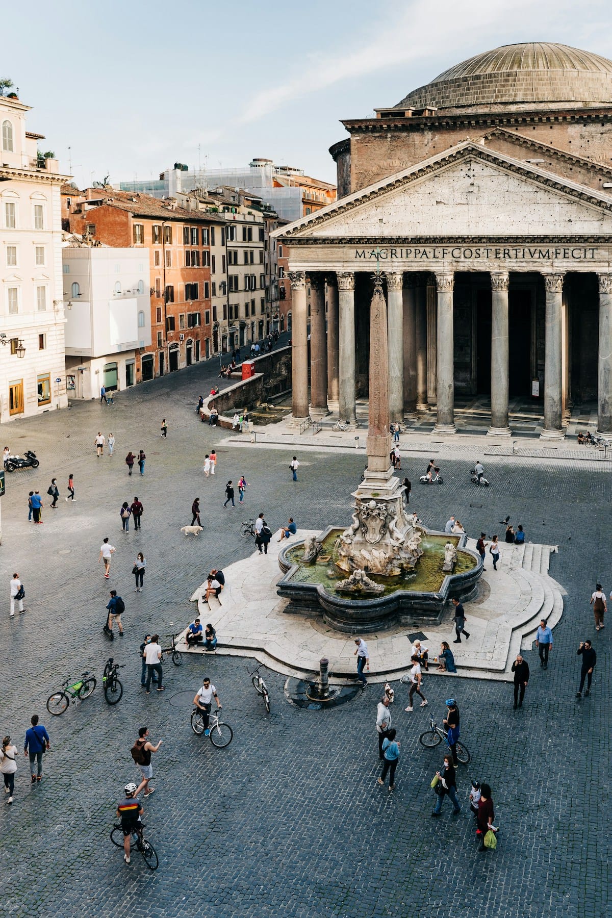 Families in Italy with kids playing, Italian square