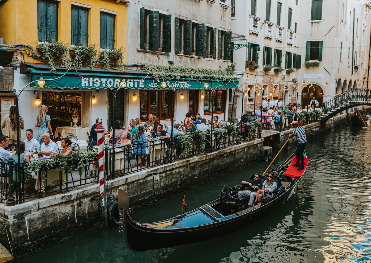 Families resting on Venice, gondola