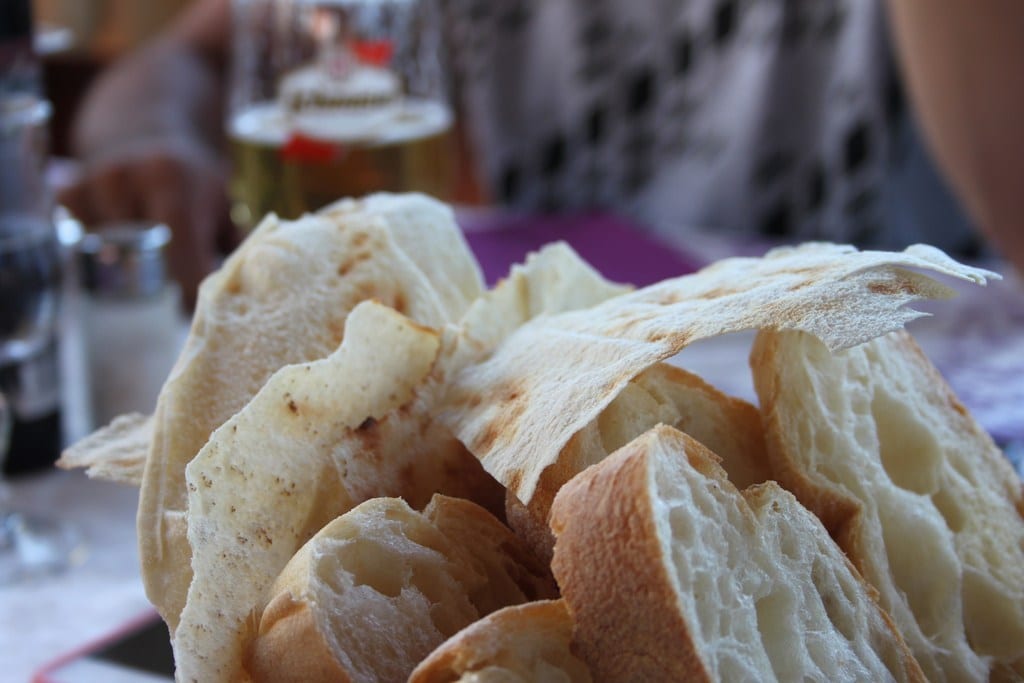 ‘Pane Sardo’, pictured on top, is a thin Sardinian bread known locally as “music bread”.