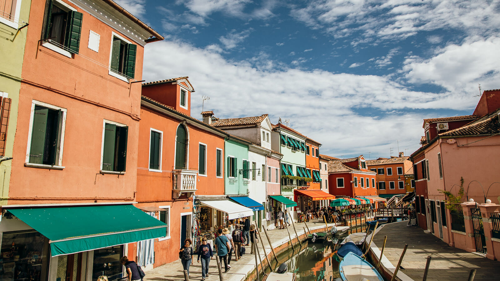 Vibrantly painted houses along the canal in Burano, Venice