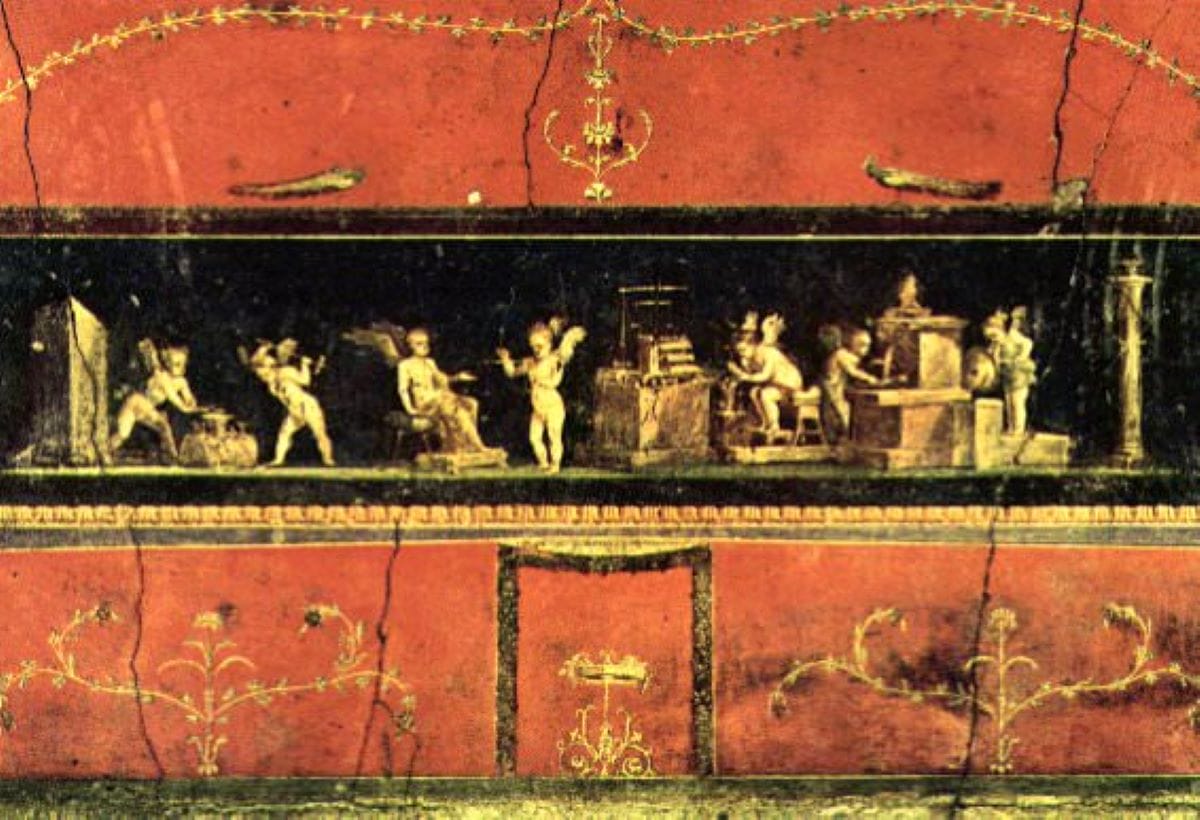 Colorful Pompeii wall paintings with a scene of cupids and red background.