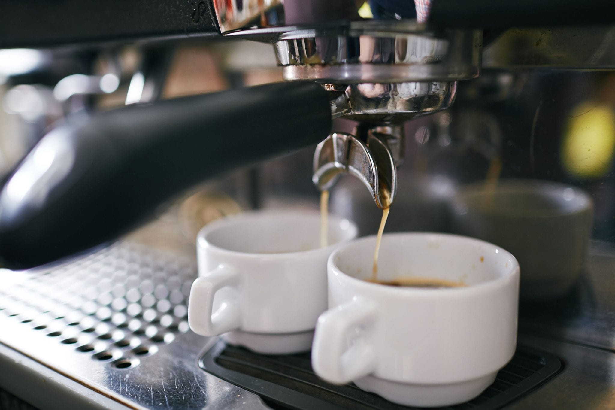 Coffee coming out of an espresso machine