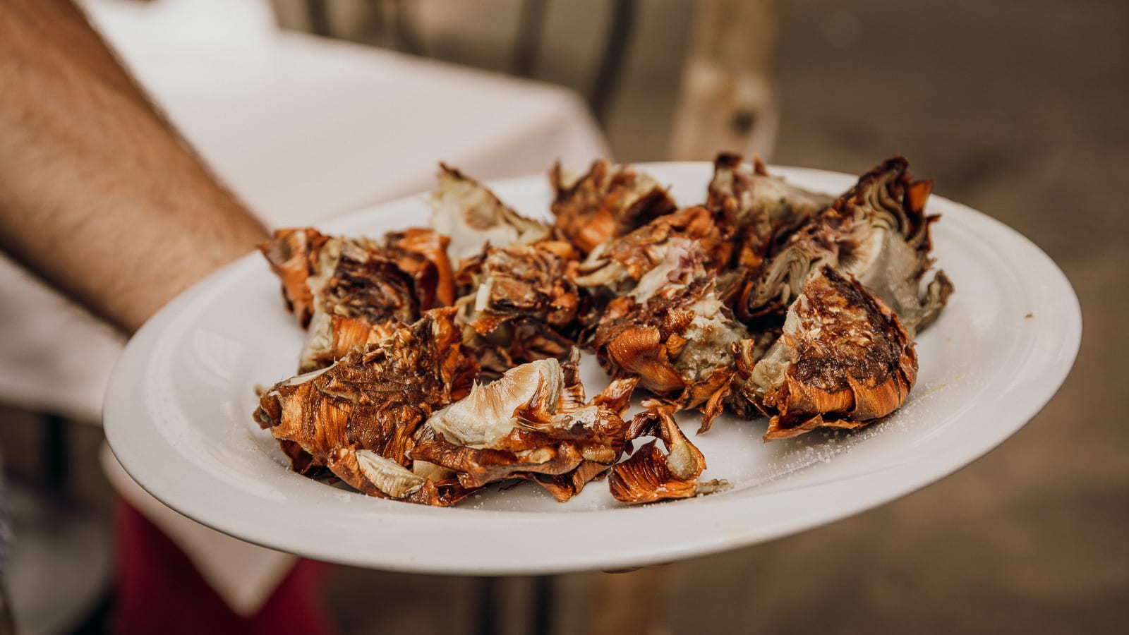 Crispy fried Roman artichokes on a plate