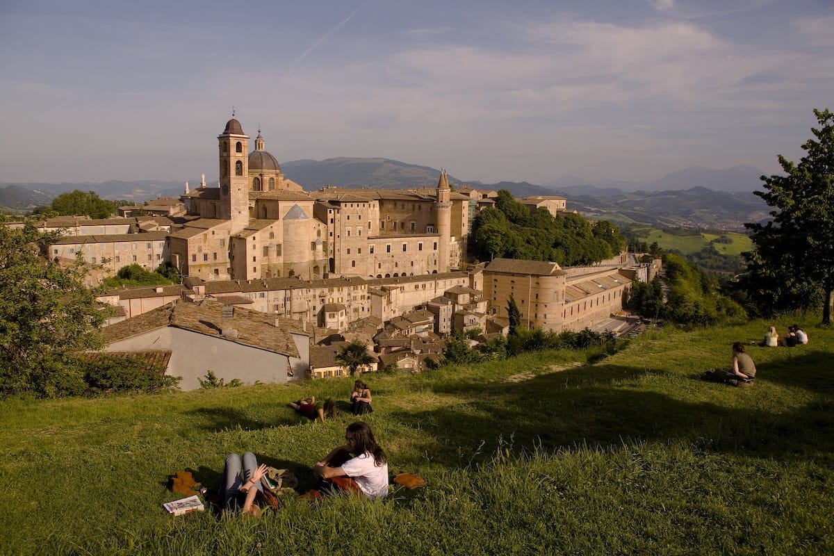 Views of Urbino with people having a picnic