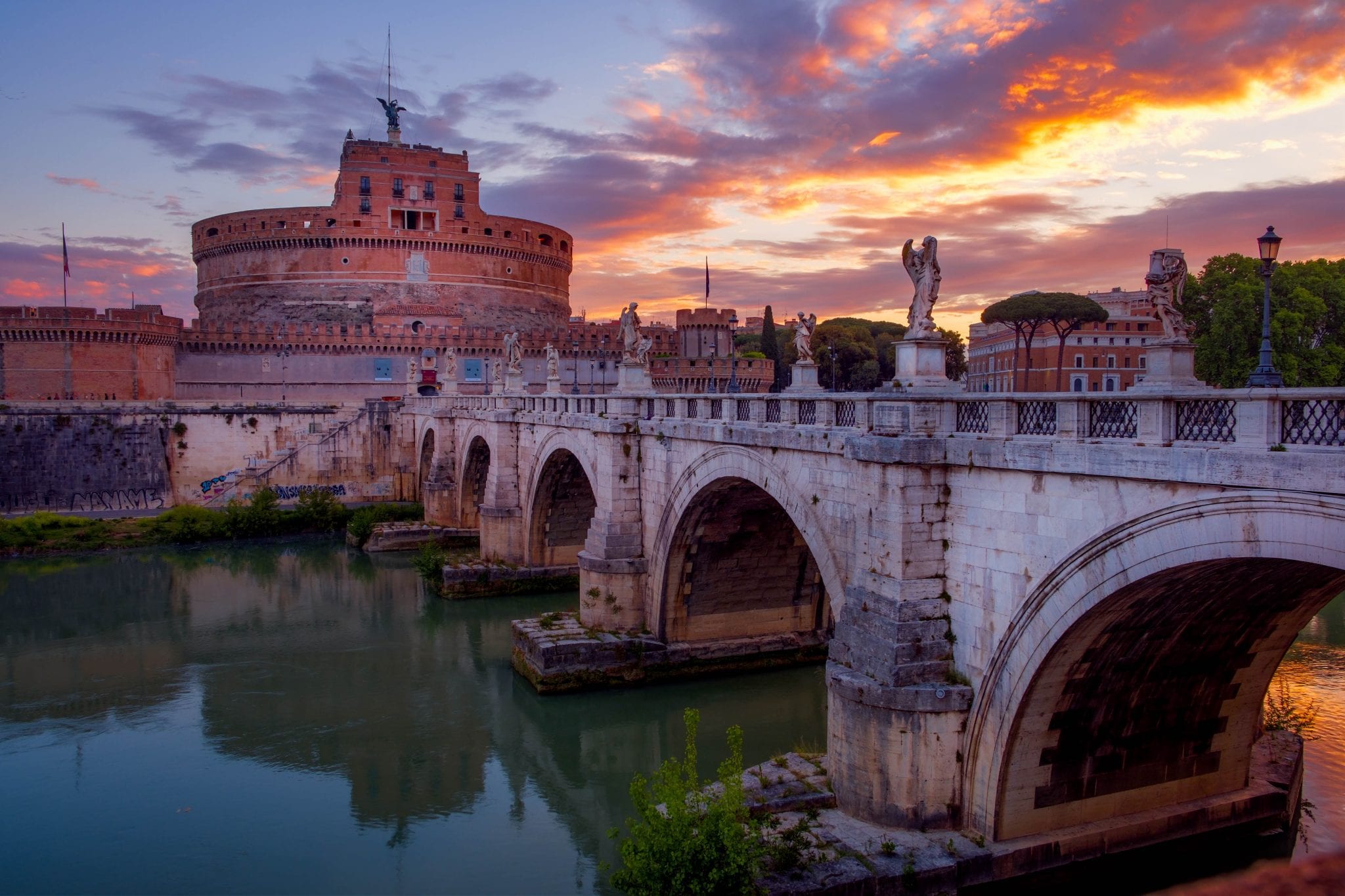Castel San Angelo in rome, in front of a sunset sky