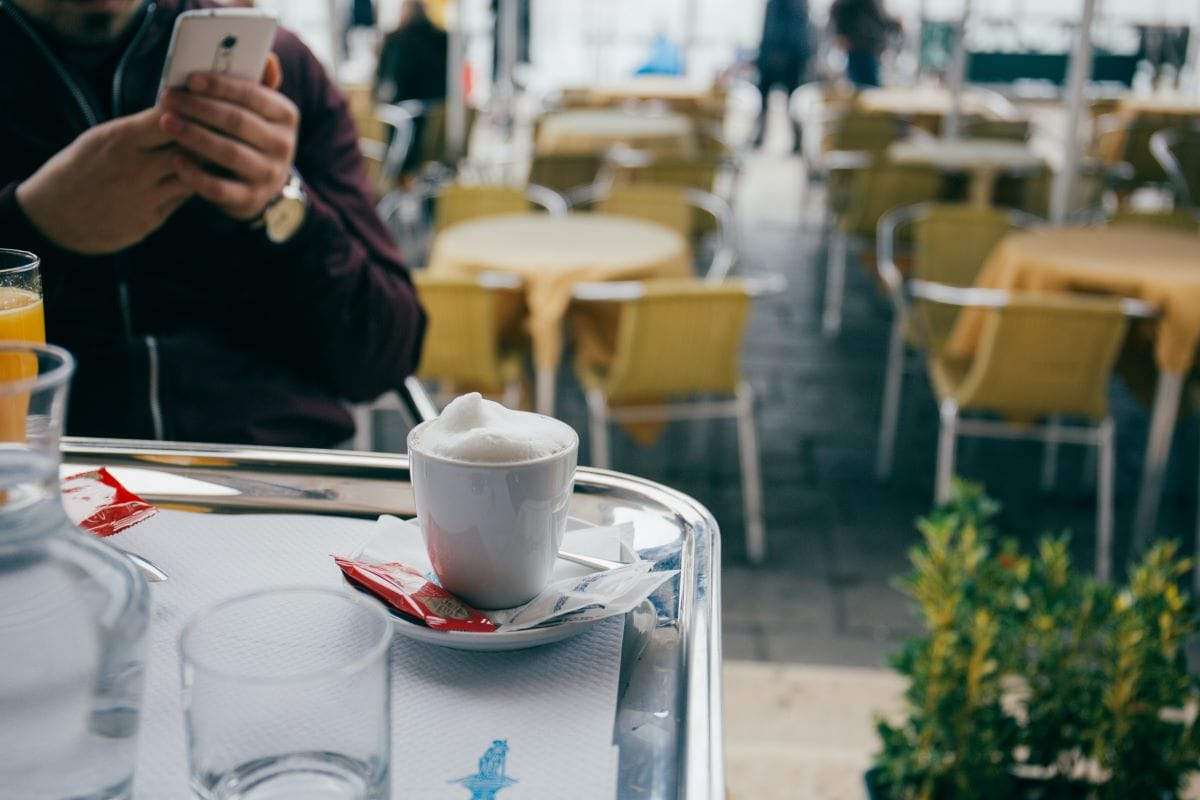 closeup of cappuccino outside at a terrace in Venice. 