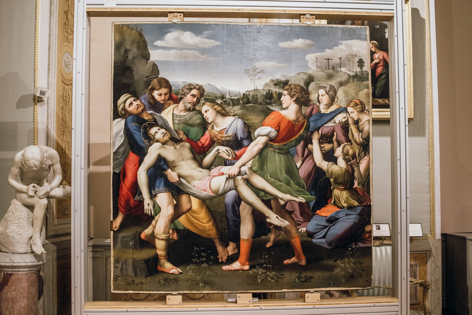 A painting which depicts several figures who are involved in the process of taking down the body of Jesus from the cross and preparing it for burial