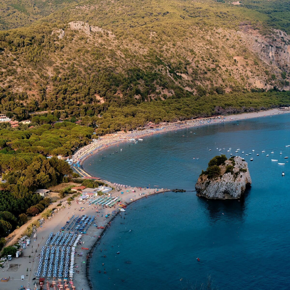 Coast of Cilento, Italy with beachside views, mountains, and a small island