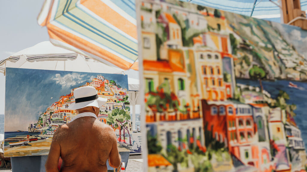 Painters honing their craft by painting the Amalfi coastline