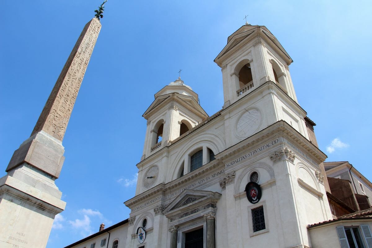 A church with a blue, sunny sky in the background