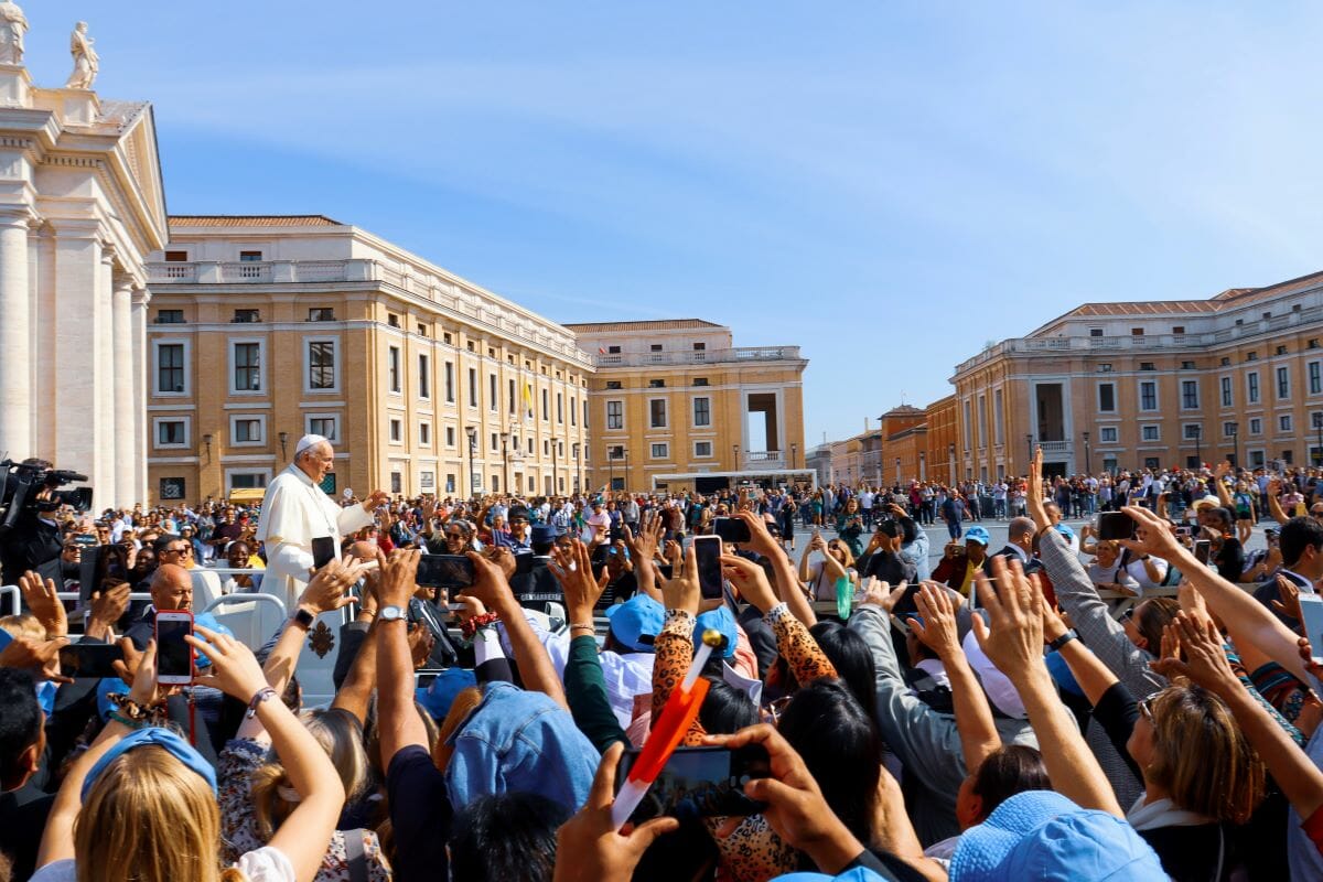 The Pope greeting a sea of vistors at Vatican City