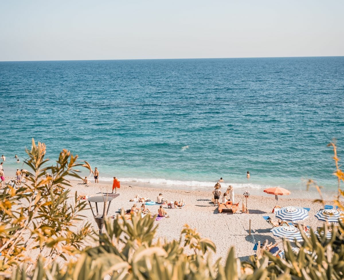 A perfect day spent at beaches in Naples, with people swimming and tanning