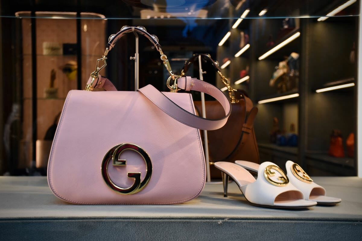 Pink purse and white shoes