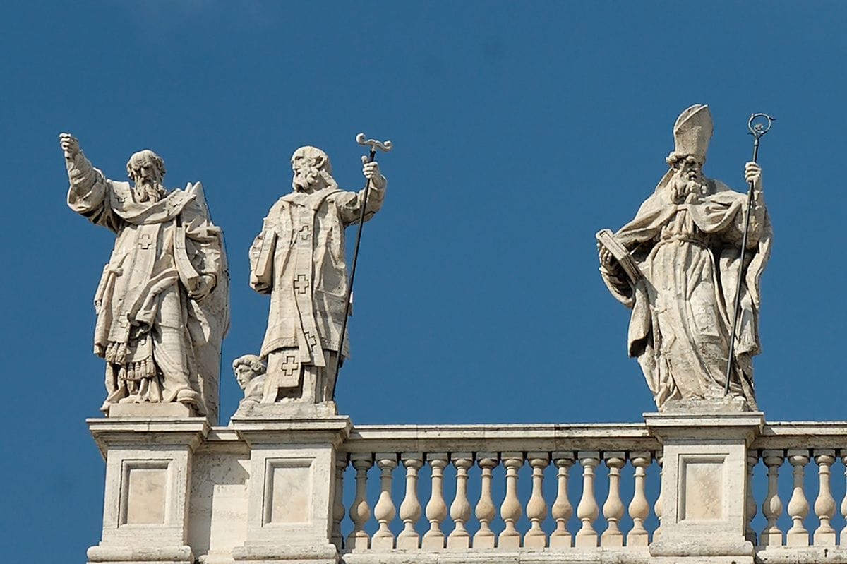 statues on top of a church