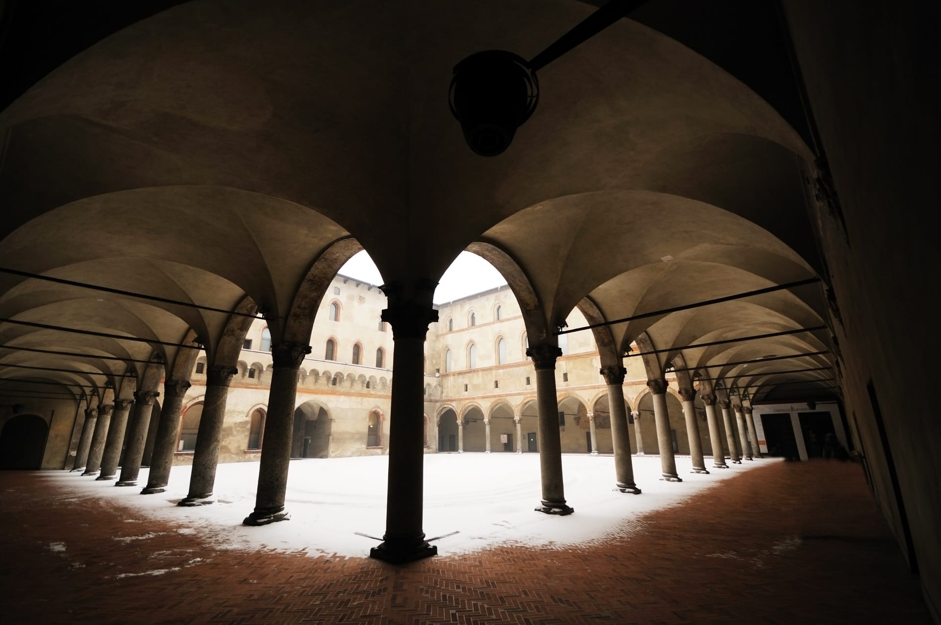 The interior patio, with ornate pillars in the Sforzesco Castle