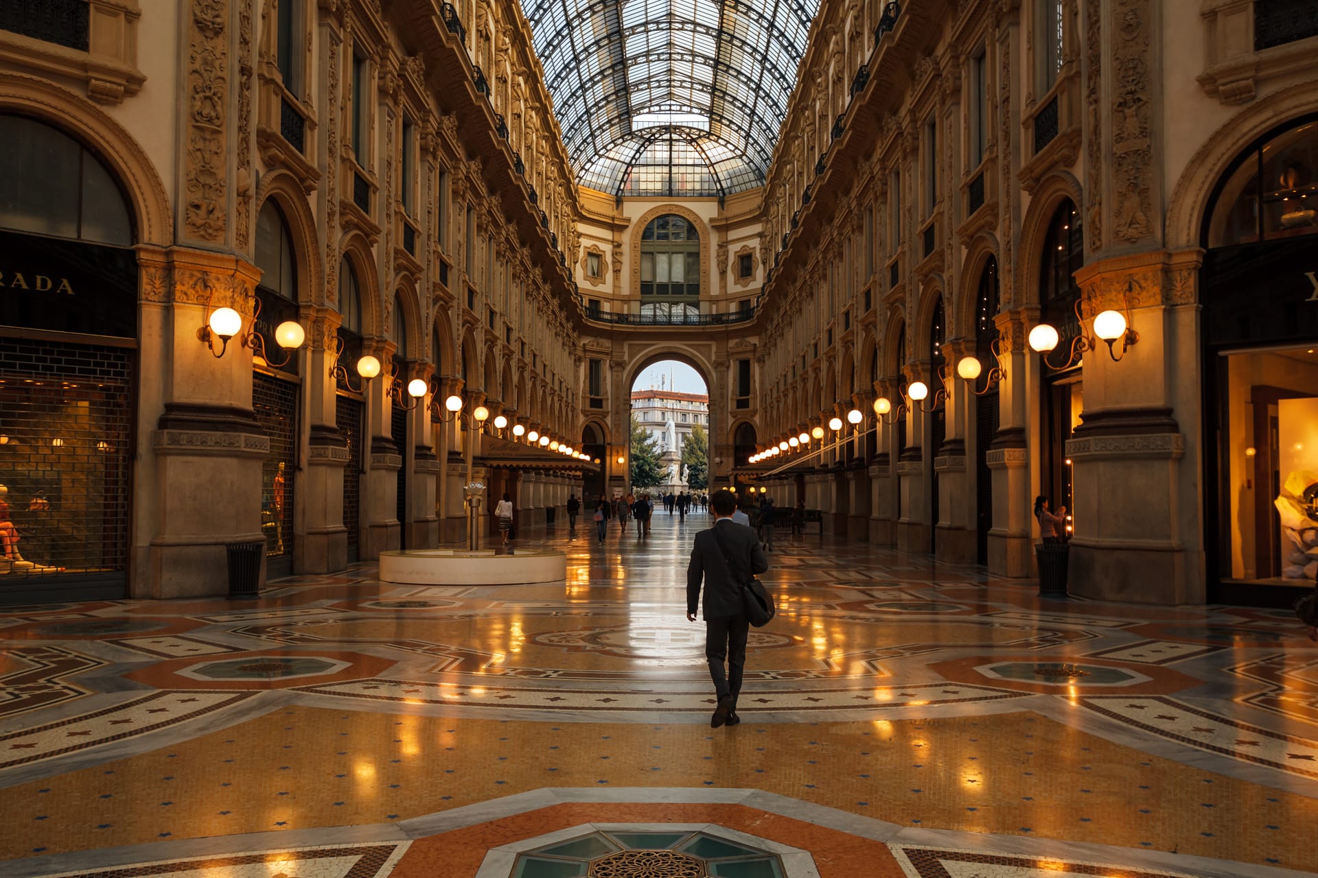 The Galleria Vittorio Emanuele II, Italy’s oldest shopping center. with glass domed ceiling and detailed mosaic floors.