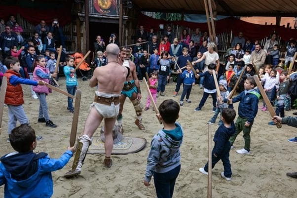 Rome gladiarot school, a group of young children take lessons from the historic group of Rome in how to be a Gladiator